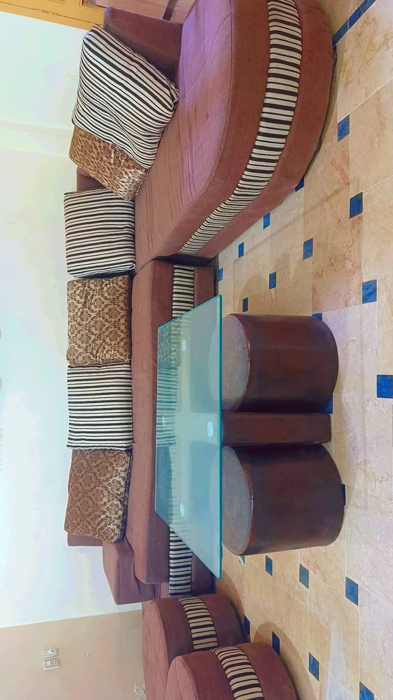 L shaped sofa set , 7seater sofa  in brown colour excellent condition 1