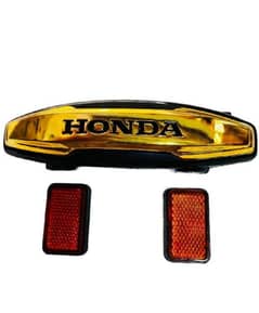 FRONT MONOGRAME AND REFLECTOR HONDA 125 2024 MODEL UNIVERSAl