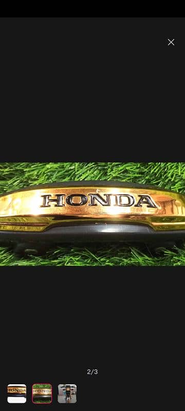 FRONT MONOGRAME AND REFLECTOR HONDA 125 2024 MODEL UNIVERSAl 7