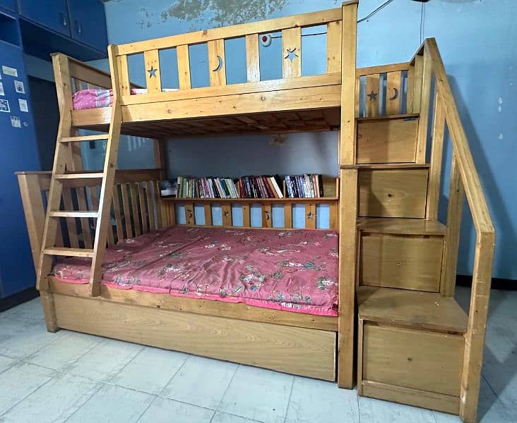 Used wooden bunker bed with a third sliding bed under. 7