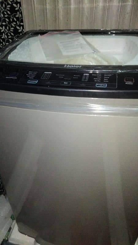 Haier fully automatic machine Brand New 3