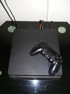 Ps4 Slim with one controller (bought from Saudi Arabia)