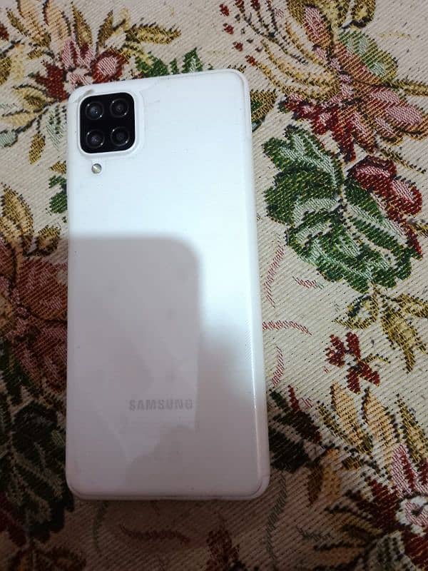 Samsung a12 4gb 64gb 10/9.5 condition with 4