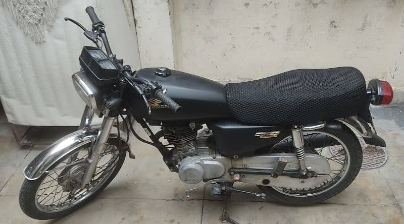 Honda GG125 with extra Saman 0