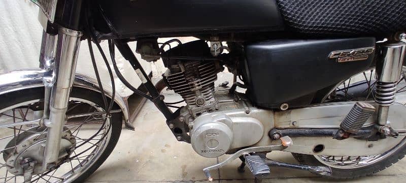 Honda GG125 with extra Saman 2