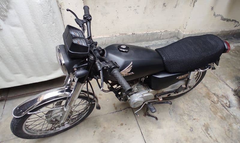 Honda GG125 with extra Saman 3