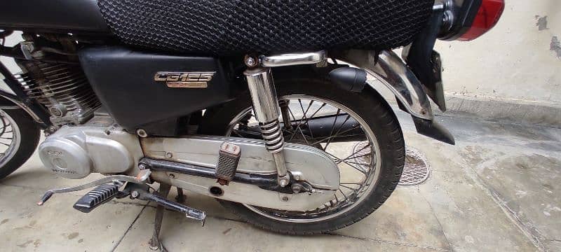 Honda GG125 with extra Saman 12