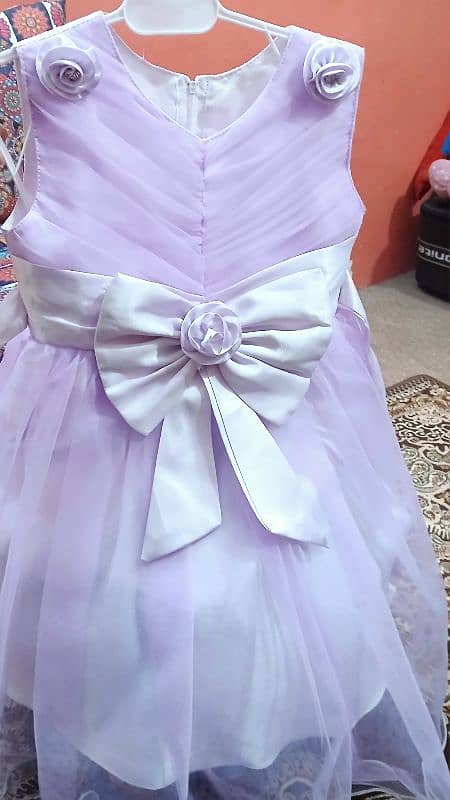 Bow style light purple frock 3