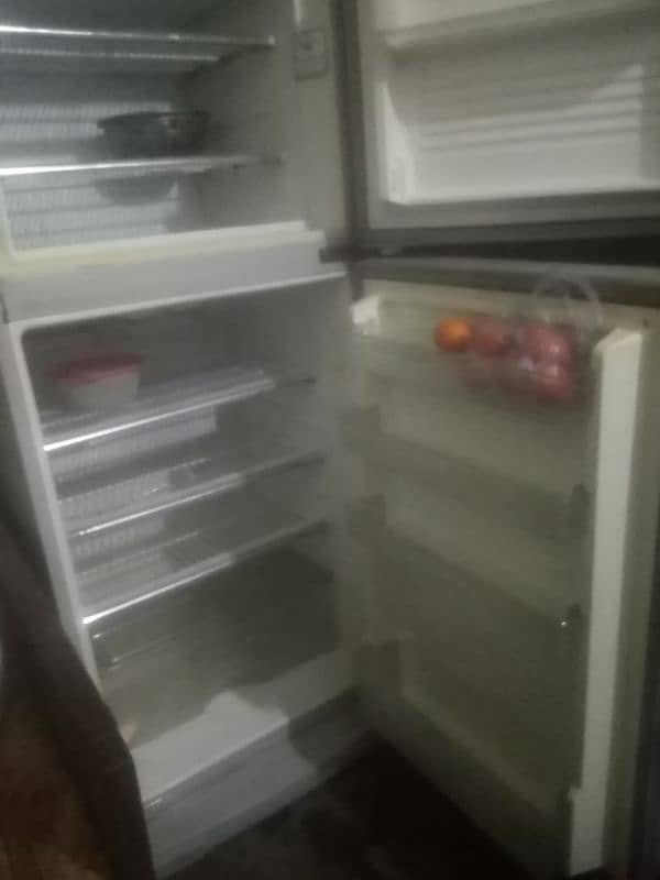 dawlance full saiz or medium size fridge 9