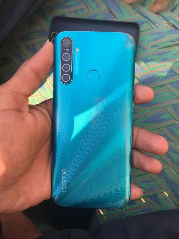 realme 5i 4/64 box ha charger ni ha 0