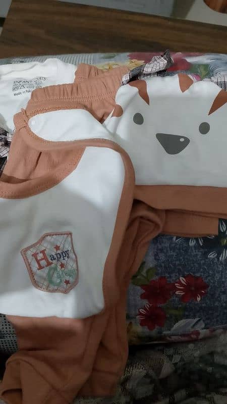 new clothes n swaddle in very excellent condition 1