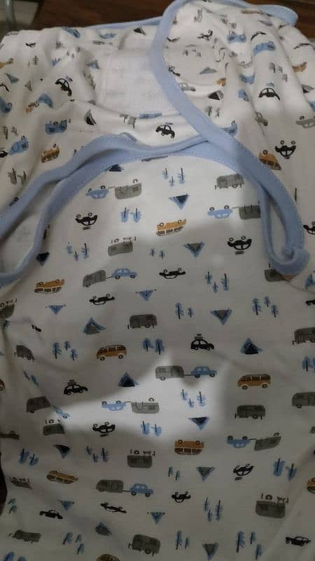 new clothes n swaddle in very excellent condition 5