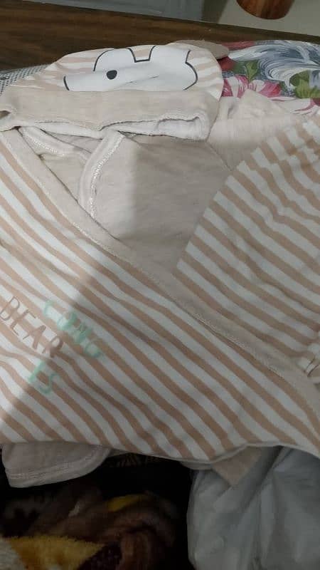 new clothes n swaddle in very excellent condition 6