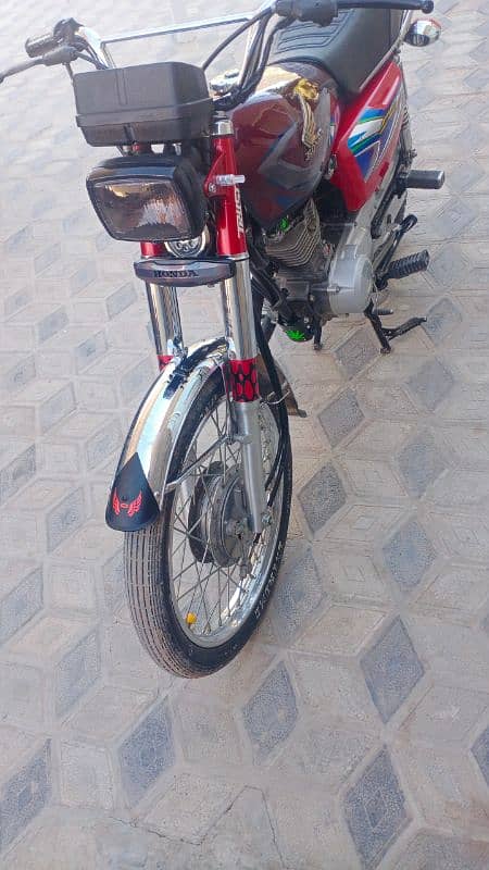 Honda125.22model ha achi condition ma 10/10 Islamabad number ha 2