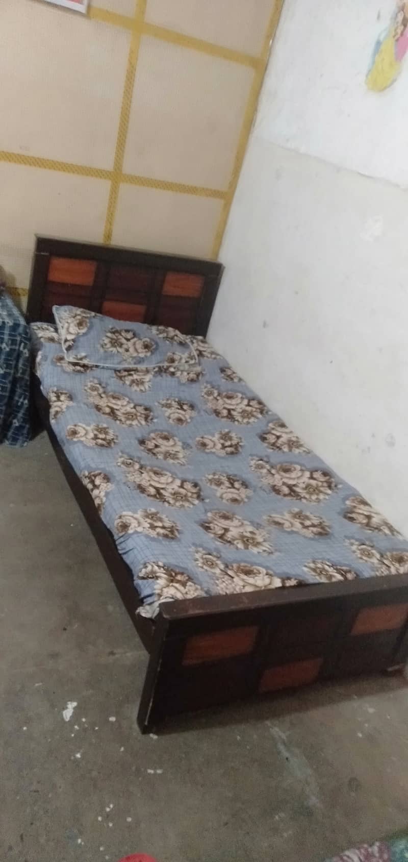 Used two single bed for sale with mattress 0