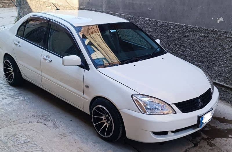 Mitsubishi Lancer 2006 japani manual 0