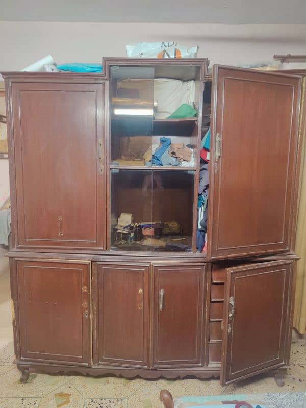 selling this used cupboard few doors need to be fixed 0