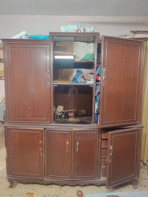 selling this used cupboard few doors need to be fixed 1