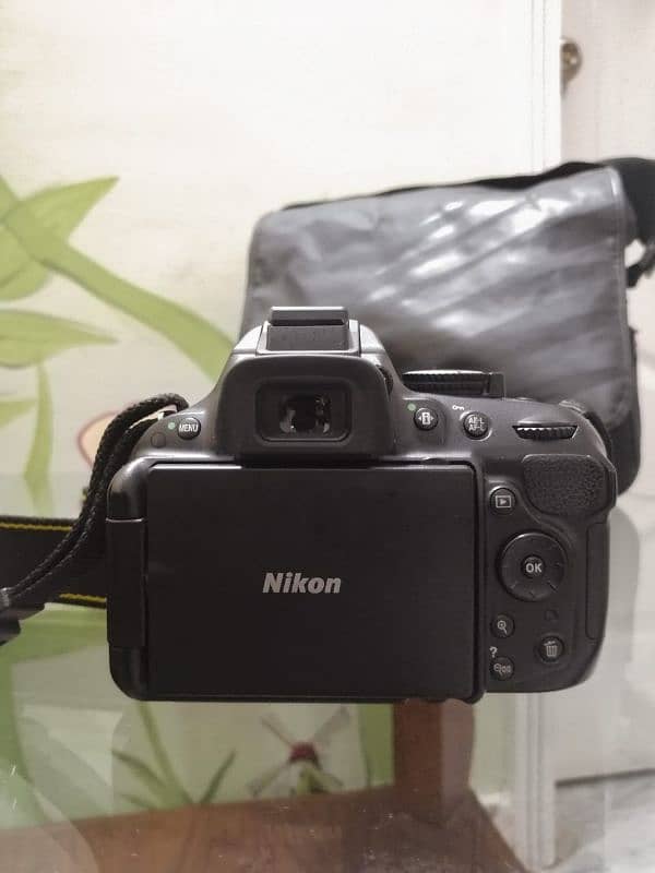 Nikon d5200 with 2 lens + batteries + wifi adapter + box 11