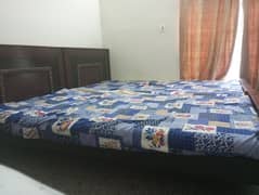 2 wooden single beds with mattress for sale