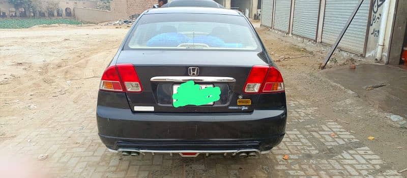 Honda Civic Oriel 2006 total janvan 12