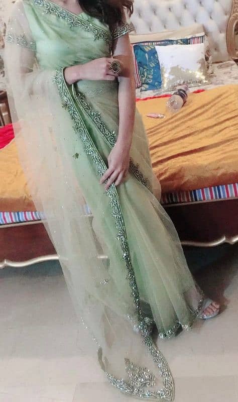 light sea green net saree small size 0