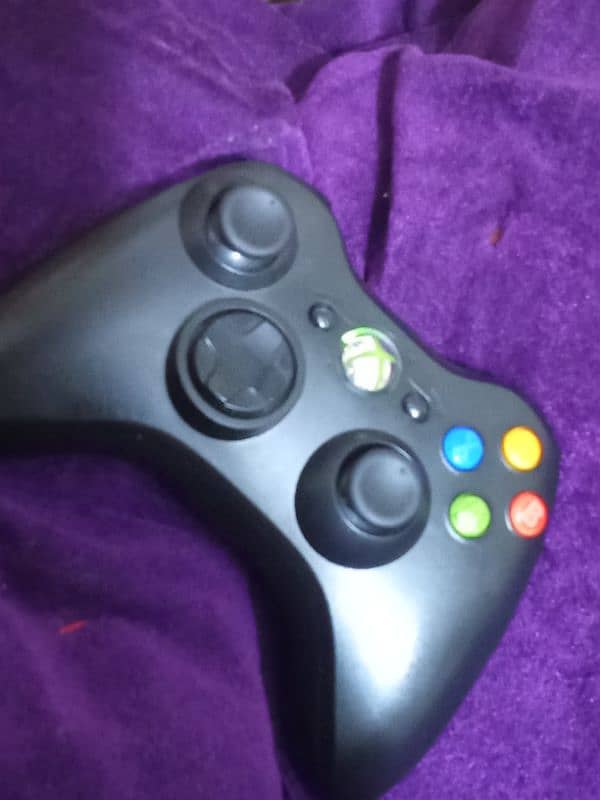 XBox 360 With One Wireless and one wire Remote 1