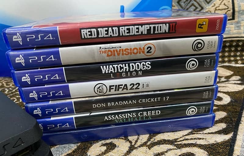 PS4 Playstation Slim 1TB with 7 Games DISKS 2