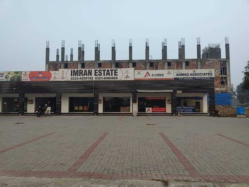 2.5 Marla Commercial Shop 150Ft Road Main Boulevard With 50Ft Parking For Sale 45000 Thousand Per Rent Out He All Deus Clear He Prime Location &Amp; Invest Price Me Only 1 Crore 25 Lac Me All deus clear 2