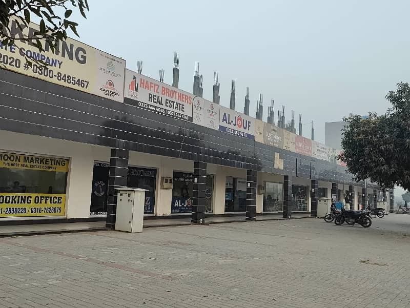 2.5 Marla Commercial Shop 150Ft Road Main Boulevard With 50Ft Parking For Sale 45000 Thousand Per Rent Out He All Deus Clear He Prime Location &Amp; Invest Price Me Only 1 Crore 25 Lac Me All deus clear 3