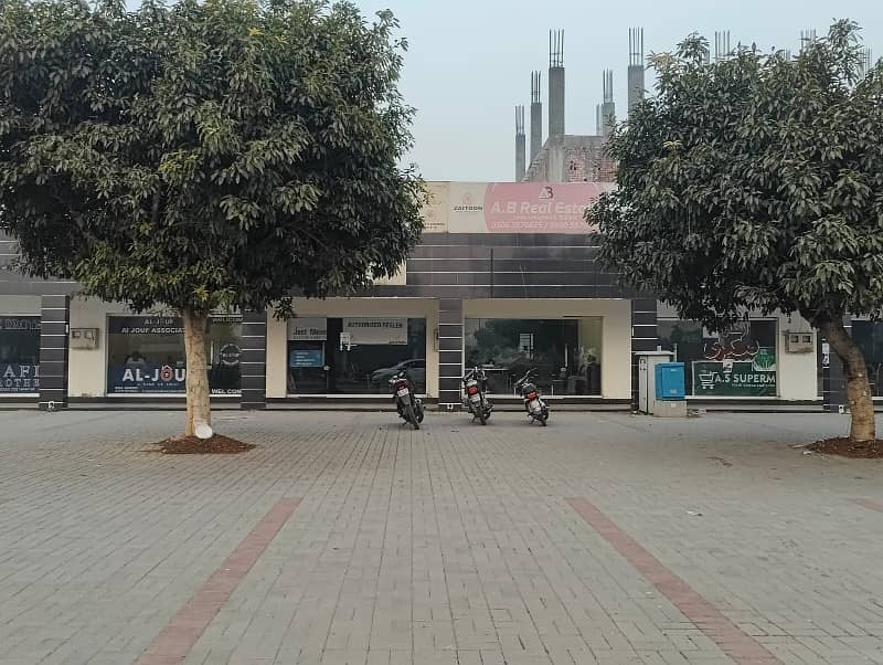 2.5 Marla Commercial Shop 150Ft Road Main Boulevard With 50Ft Parking For Sale 45000 Thousand Per Rent Out He All Deus Clear He Prime Location &Amp; Invest Price Me Only 1 Crore 25 Lac Me All deus clear 4