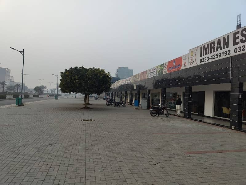 2.5 Marla Commercial Shop 150Ft Road Main Boulevard With 50Ft Parking For Sale 45000 Thousand Per Rent Out He All Deus Clear He Prime Location &Amp; Invest Price Me Only 1 Crore 25 Lac Me All deus clear 5