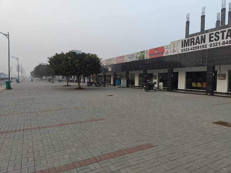 2.5 Marla Commercial Shop 150Ft Road Main Boulevard With 50Ft Parking For Sale 45000 Thousand Per Rent Out He All Deus Clear He Prime Location &Amp; Invest Price Me Only 1 Crore 25 Lac Me All deus clear 6