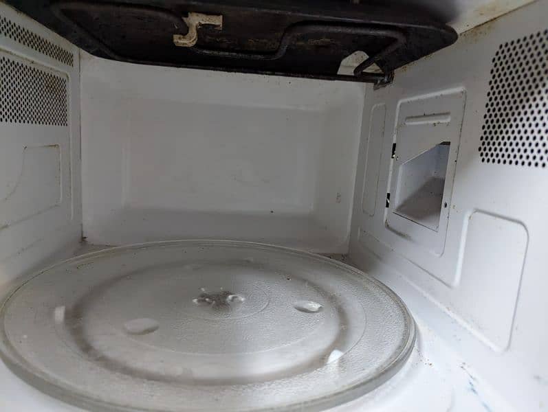 microwave oven for sale (not in working condition) 5