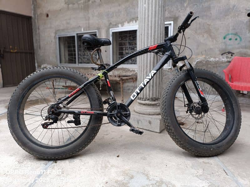 Fat bike with gears and disk brakes, shocks absorbers, speedometer 1