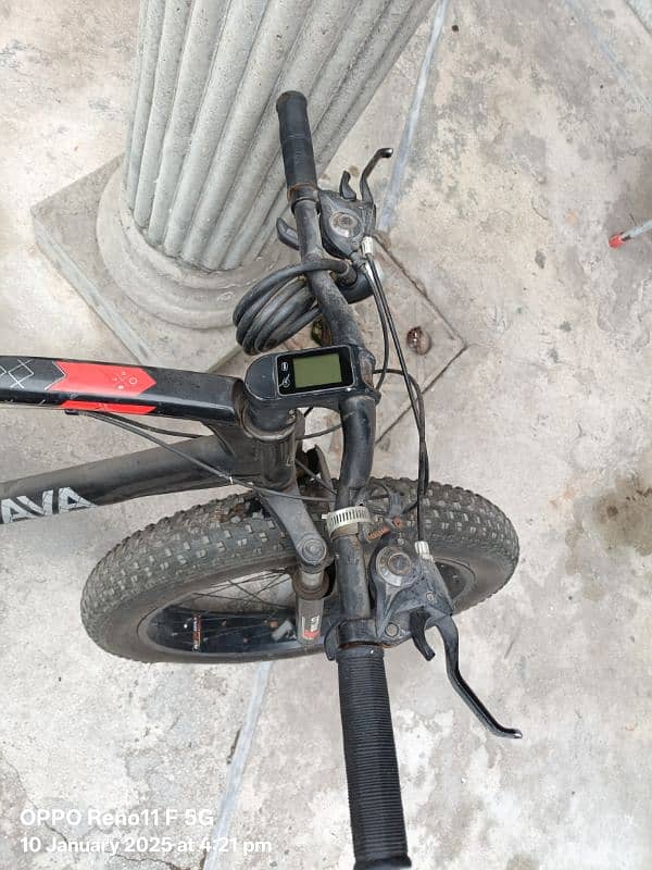 Fat bike with gears and disk brakes, shocks absorbers, speedometer 6