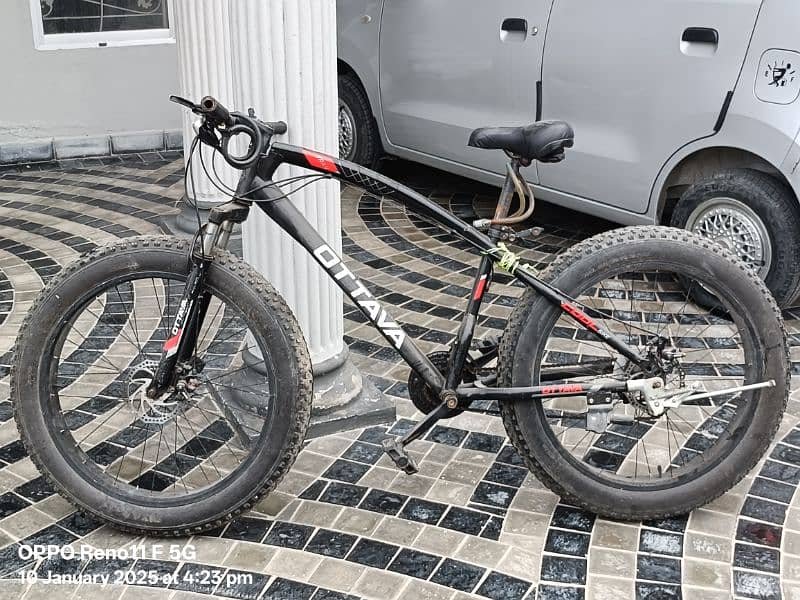 Fat bike with gears and disk brakes, shocks absorbers, speedometer 7