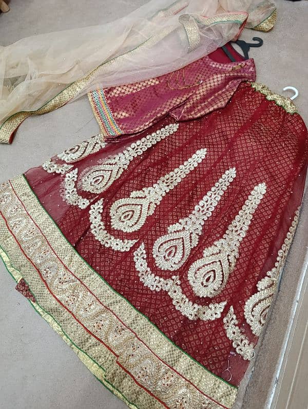 beautiful 3 piece indian lehnga in red and gold 3