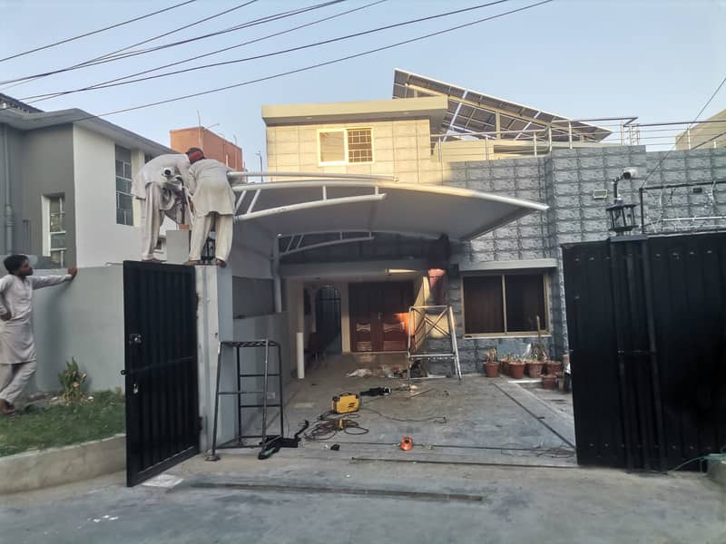 Tensile Shades in Pakistan - Wall mounted shed - Car Park - Marquee 1