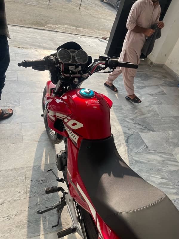 i am selling my honda 150F red colour 6