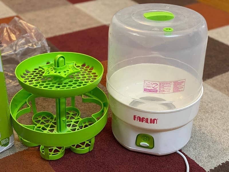 Carry Cot, Stroller , bottle Sterilizer 1