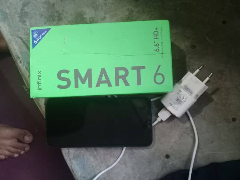 Infinix smart6 with box and charger 5