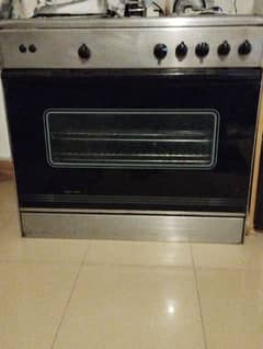 cooking range with 5 burner and glass cover