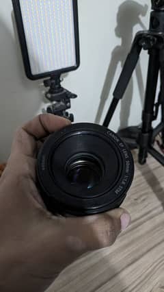 Canon 50mm STM 1.8 with hood