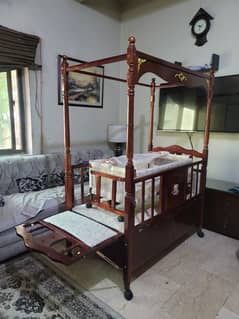 Pure wooden cot with swing