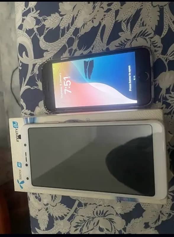 iPhone se2 &telenor a4 (exchange possible ) 0