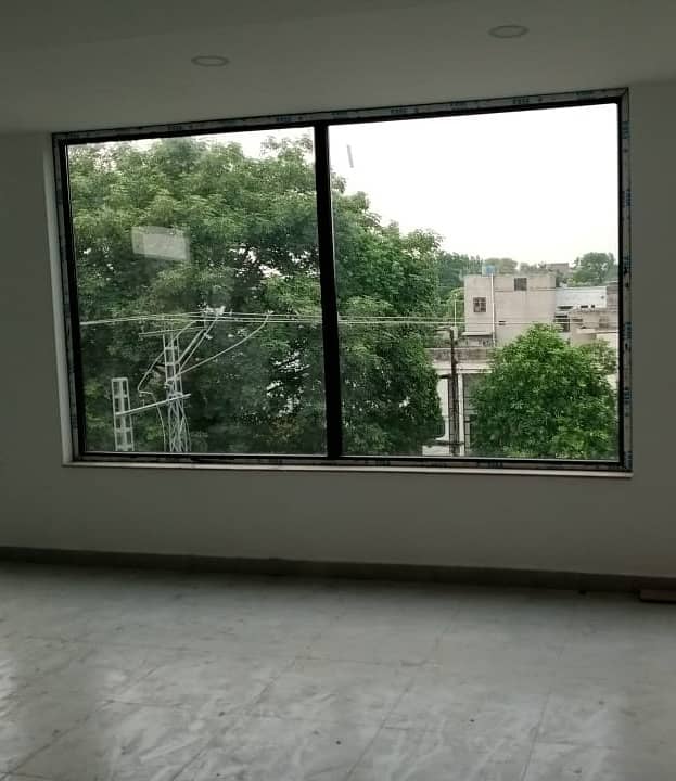 One kanal Commercial Paid 3 story Plaza available for rent in Johar Town Lahore 5