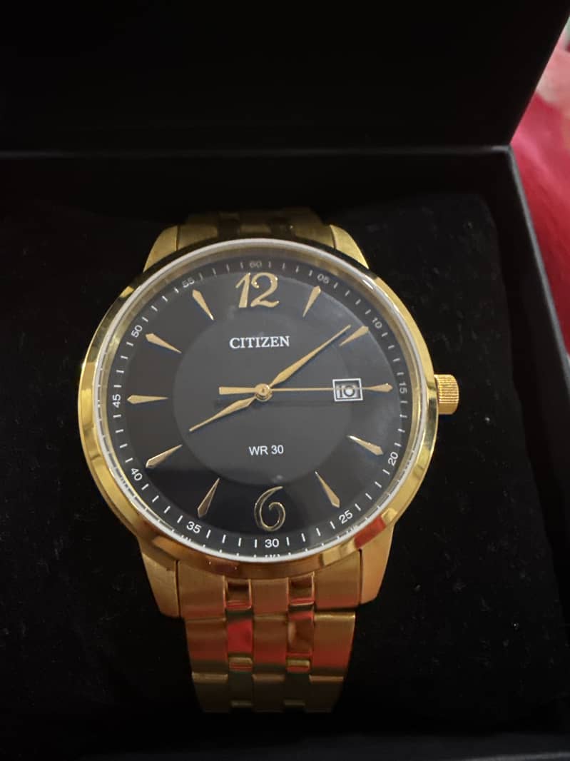 Citizen golden watch 1