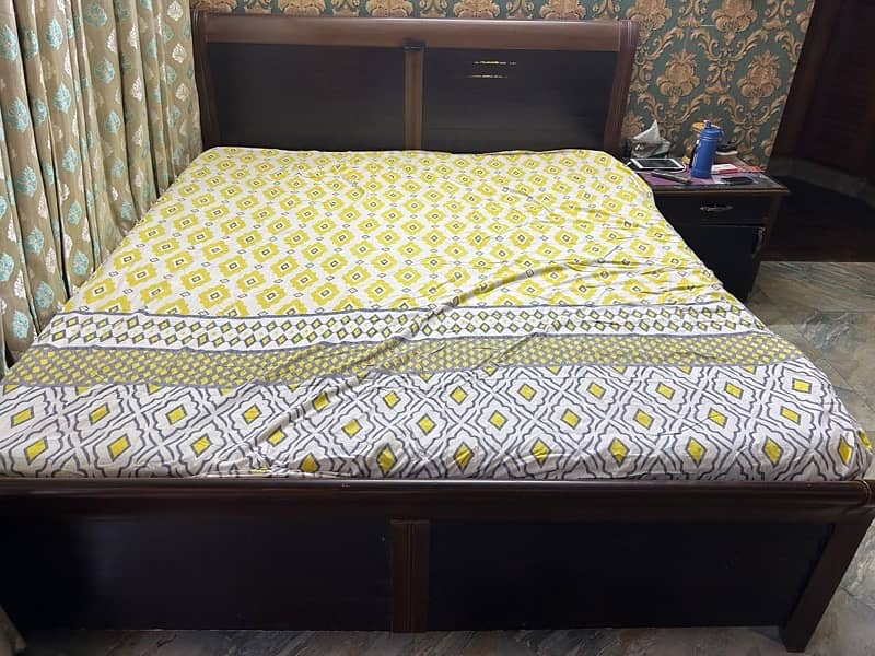 Double bed with side table and sprigs mattress 2