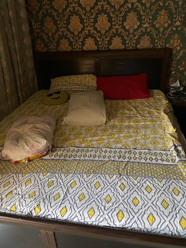 Double bed with side table and sprigs mattress 4